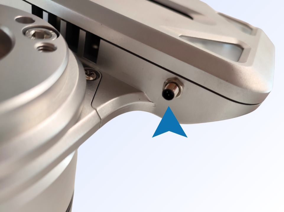 Pinned end of the LED cable inserted into the connection slot on the camera case
